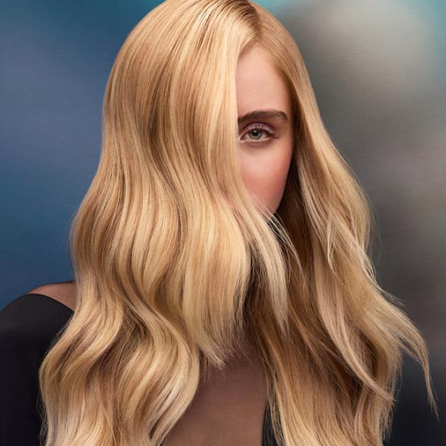 Model with long, loosely tousled, golden blonde hair.