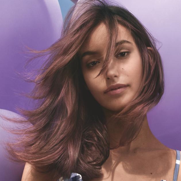 Model with pink muted mermaid hair color, created by Wella Professionals