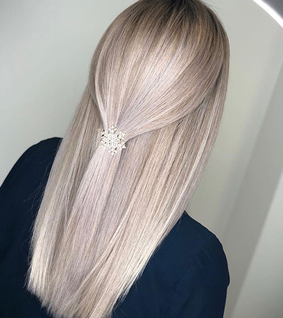 Frosted ash blonde hair, created using Wella Professionals