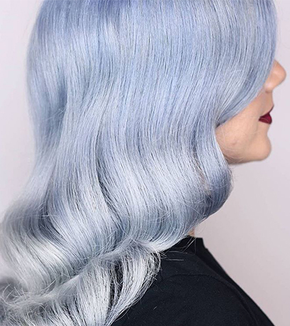 Soft icy blue hair, created using Wella Professionals