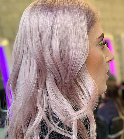 Pearlescent pink hair, created using Wella Professionals