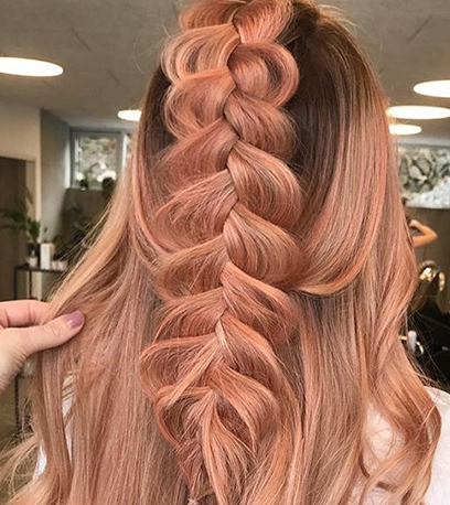 Peach pastel hair, created using Wella Professionals