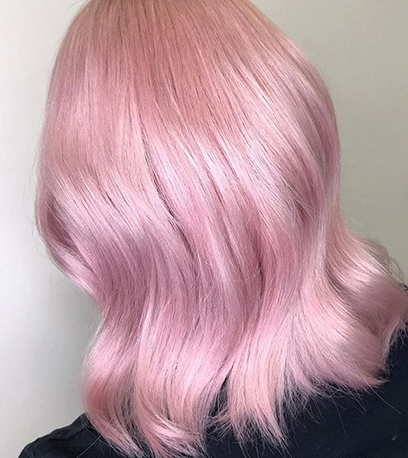 Blush pink hair, created using Wella Professionals