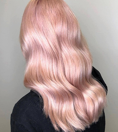 Powder rose gold hair, created using Wella Professionals