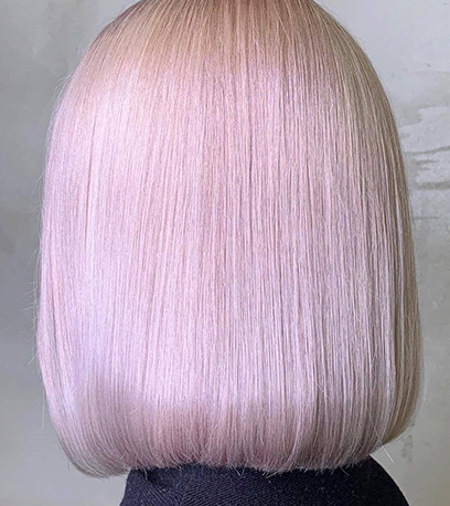 Pearlescent pink hair, created using Wella Professionals