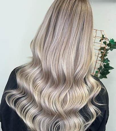 Hair treated with Nude Cashmere Naturals Collection with a focus on Shinefinity Glaze